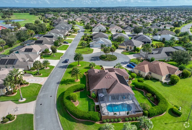 Village of Fernandina is spry with backyard pools and luscious lawns.