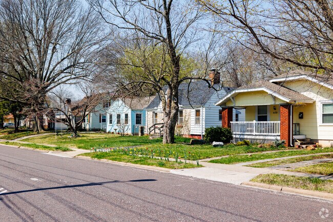 Home owners in Phelps accentuate their homes with bold colors and bright landscaping.