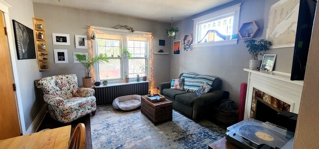 Spacious Living Room with Large Windows & Natural Light