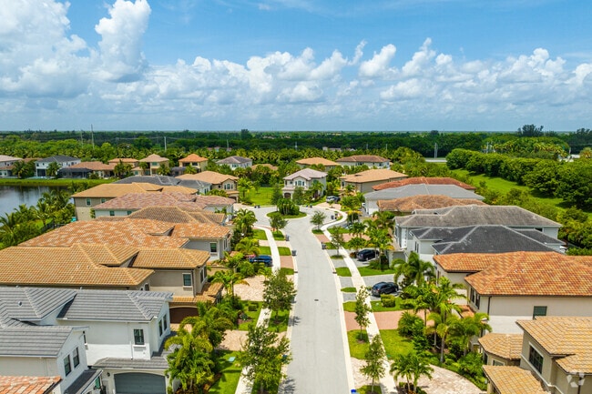 Many homes in the Lotus community of West Delray offer terracotta roofs and manicured lawns.
