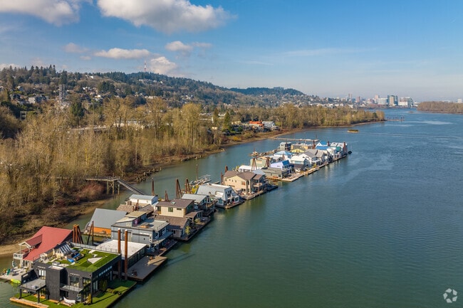 Boat house with a docking station right by the water in South Portland, Oregon.
