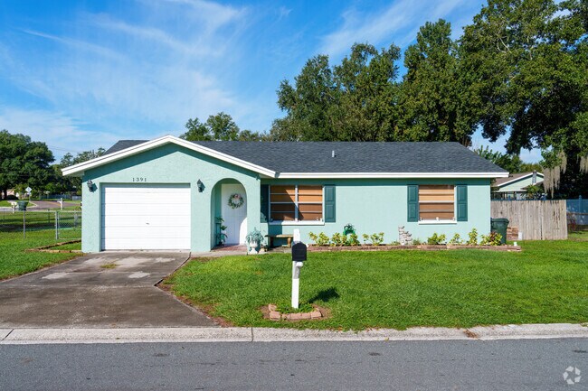 A unique blue hue adds charm to this quaint single-family home in Crystal Lake.