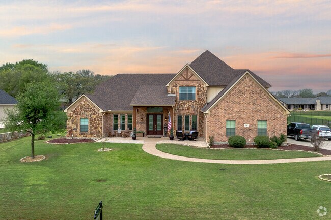 The outskirts of Lantana offers Large homes with a mix of brick and stone exterior.
