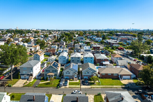 Most houses in the Bayway area are around 100 years old and sit on tree-lined streets.