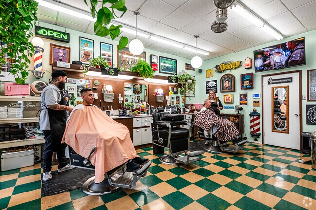 Valle Hermosa residents enjoy a cut and shave at Art’s Barbershop in downtown.