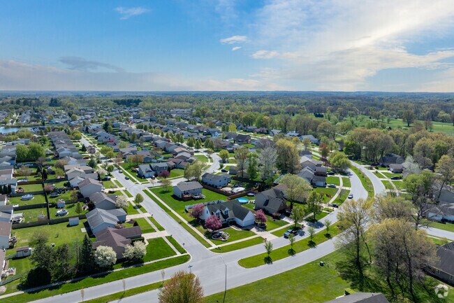 Ainsworth homes have large lots with front and back yard lawns with two car garages.