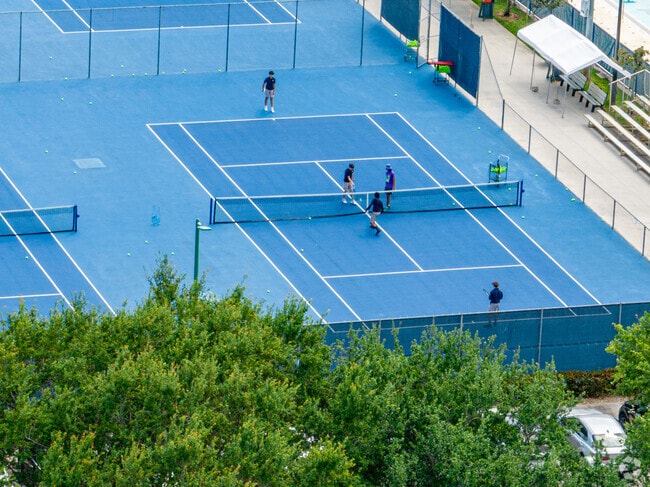 Perfect your serve on the tennis courts at American Academy, Palm Beach Campus.