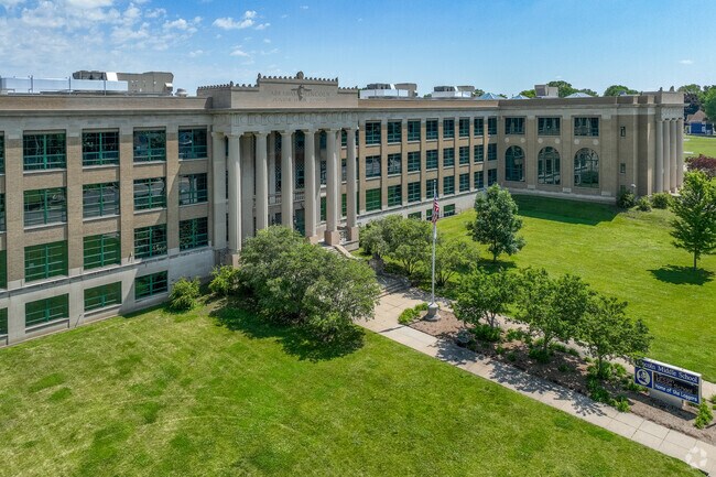 Lincoln Middle School looks stately with large pillars near Jackson Oaks.