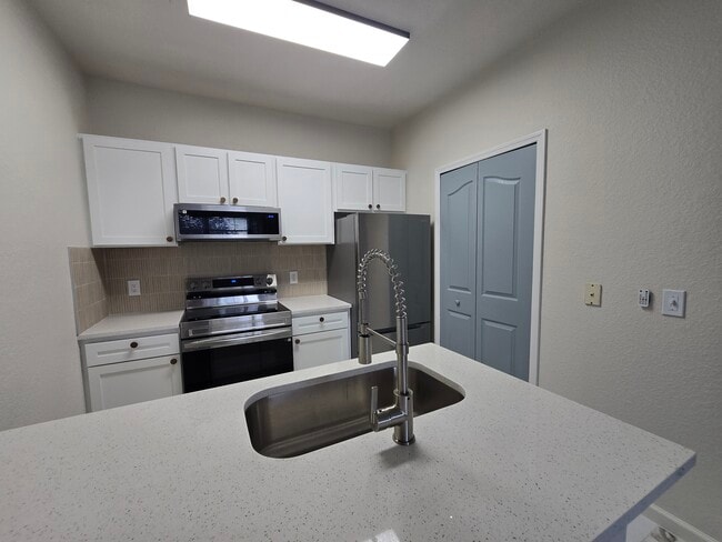 6137 Metrowest Blvd unit 6137 Metrowest Blvd., Orlando, FL 32835 - photo 6
