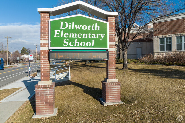 Dillworth Elementary School has a narrow electronic sign on a brick structure