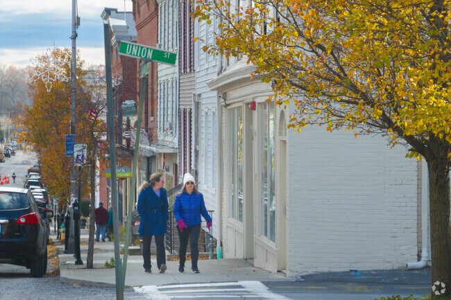 Athens residents stroll Main Street in Athens.
