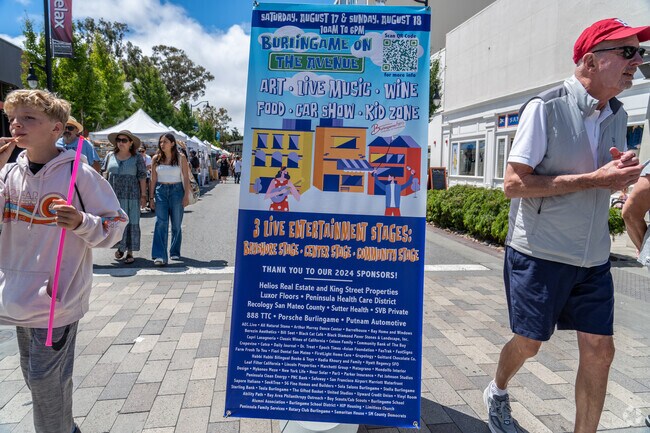 Families explore colorful stalls and enjoy live entertainment at Burlingame on the Avenue 2024.