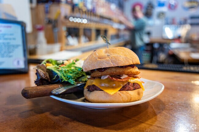 The Tap House's western burger goes great with a beer in Downtown Dallas.