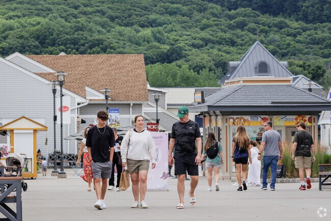 Woodbury Common Premium Outlets is just a 9-mile drive east, featuring 250 name-brand retailers, including Old Navy, Nike, and Calvin Klein.
