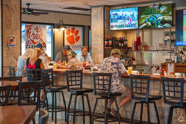 Patrons dine in at one of the many local eateries in El Conquistador.