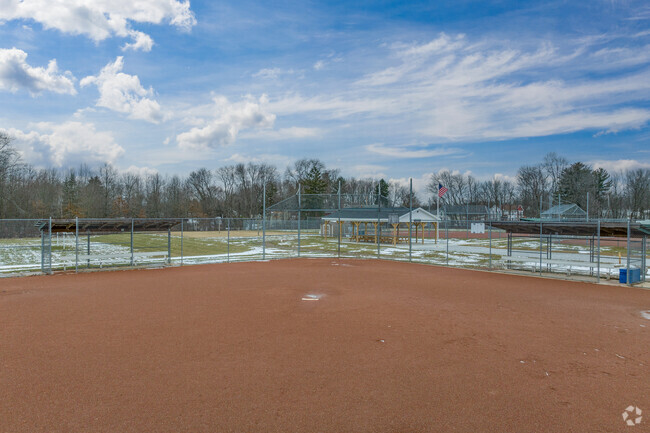Play a game of baseball at Manchester Middle School.