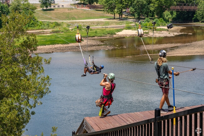 Residents of East Carver Heights can visit Uptown Columbus for zip lining or river rafting.