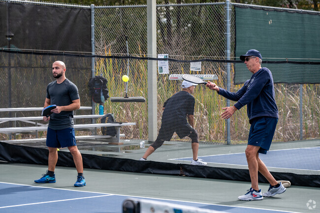 Pineridge locals enjoy a game of pickleball at Northside Park.