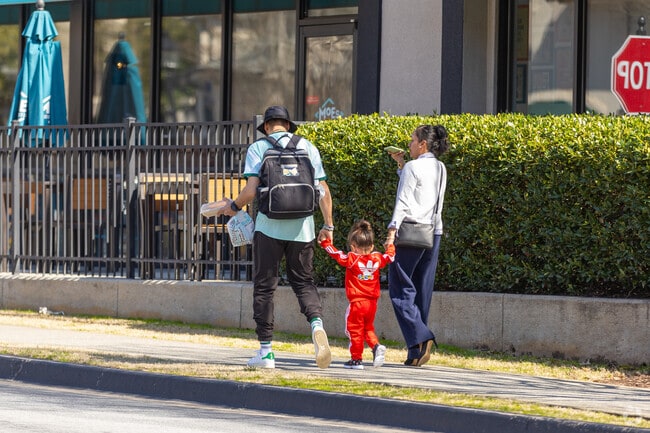 Families enjoy walking around the shopping centers of Peachtree Corners.