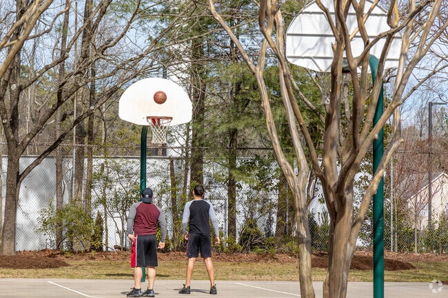 Rose Street Park provides a quiet green space to play basketball near Cary Towne Center.