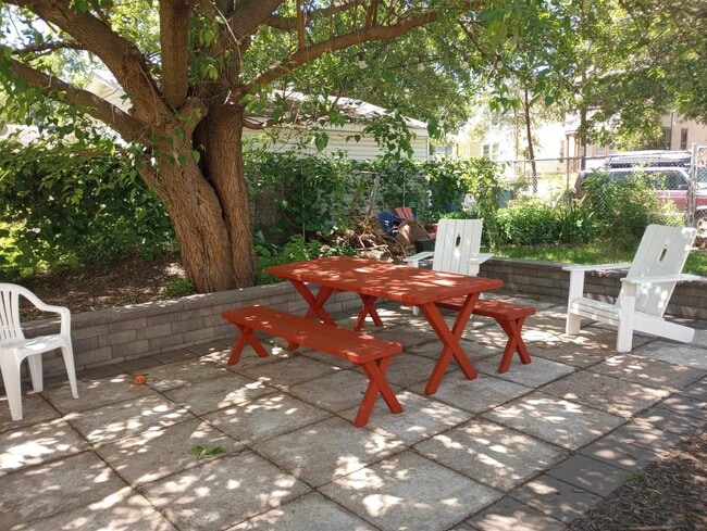 Patio and firepit in huge fenced in yard.