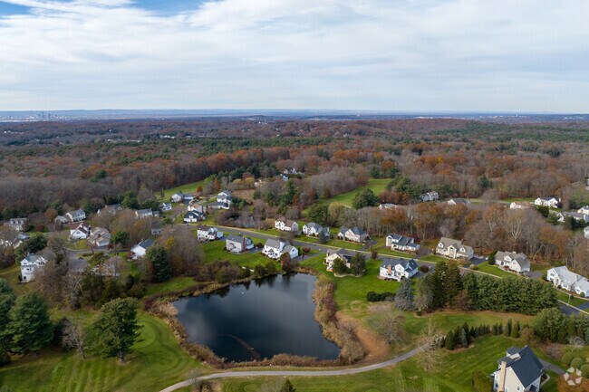 Minnechaug Golf Course has a small lake and homes on its property in Minnechaug.