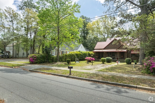 Homes in Crosswell are often surrounded by tall trees.