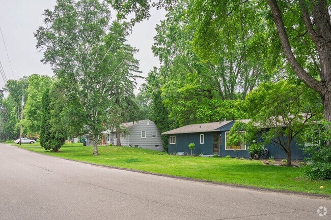 Minnetonka Mills residents enjoy elbow room on median half-acre lots, where split-level and ranch-style homes provide spacious living in a tree-covered suburban setting.