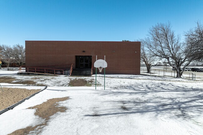 Oatville Elementary School has an outdoor basketball court.