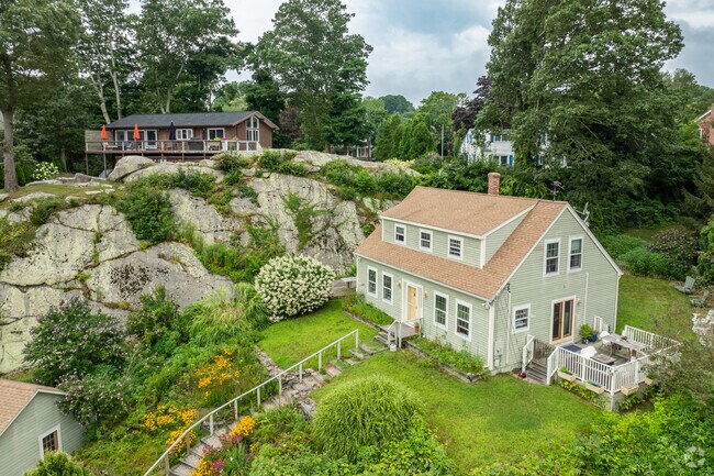 Some homes in Mystic Historic District are built directly on the towns charming ledge.