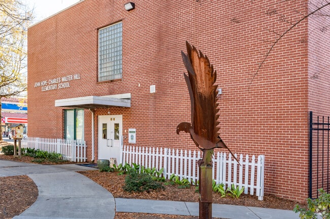 The John Hope-Charles Walter Hill Elementary School has a bird sculpture outside.