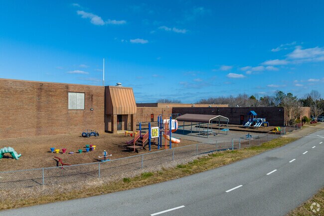Stuart Burns Elementary School has playground in the front of the school in Burns.
