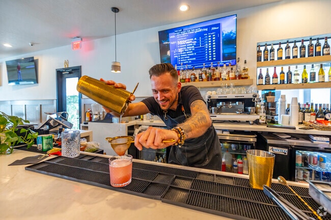 Just minutes from Hastings Farms, Social Birdie offers a vibrant atmosphere where guests can savor handcrafted cocktails while enjoying live music.