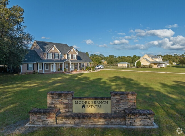Moore Branch Estates has large homes with very large yards in Outer Wes Side.