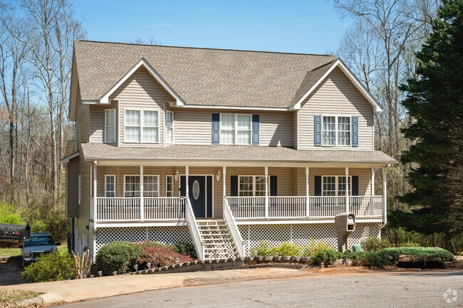 Large family homes sitting on small plots of land can be found throughout Greer.