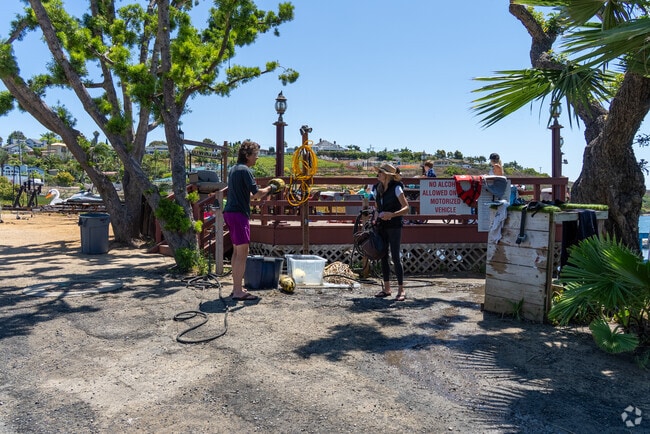 Residents and visitors to Kelly Park meet up for waterside recreation at Agua Hedionda Lagoon.
