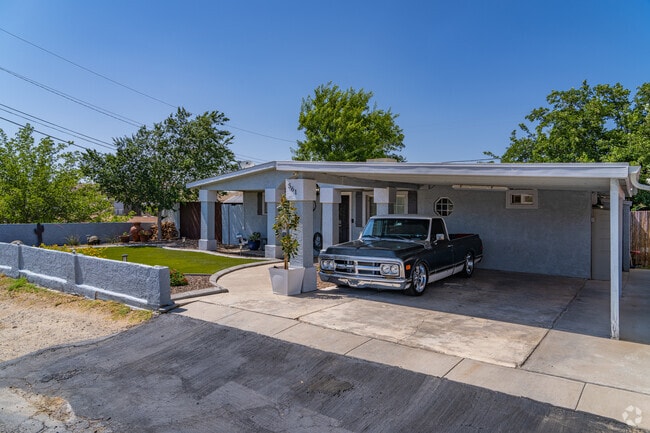 Ranch-style homes with deep driveways and front patios are common throughout Globe, offering a practical and modest residential layout.