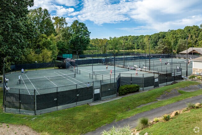 The Raintree Country Club tennis courts are a popular feature all year long.
