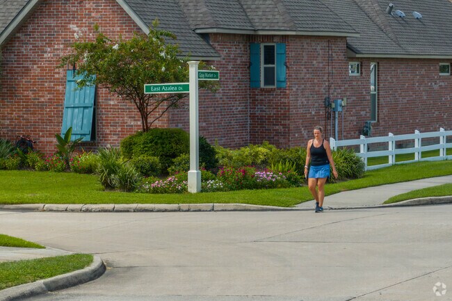 Exercising is popular in Graywood, with many residents walking the neighborhood sidewalks.