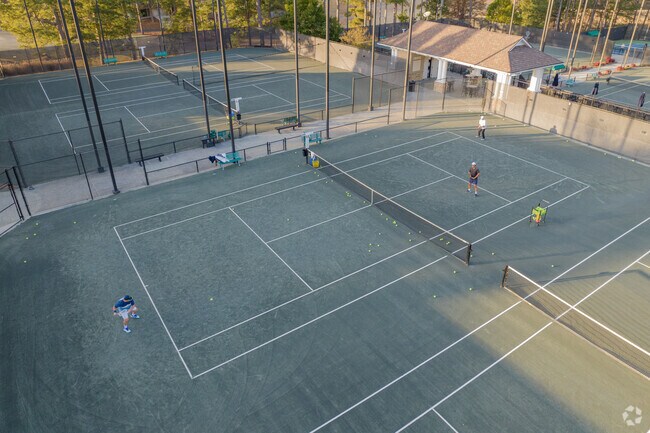 Residents can spend their afternoons on the tennis courts at the Country Club of Roswell