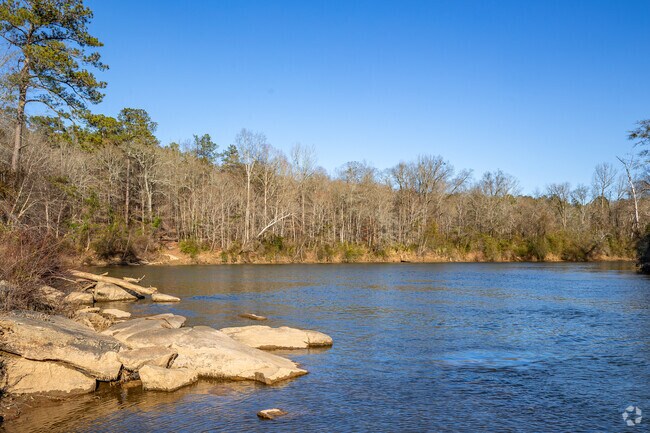 McIntosh Reserve Park supports supports outdoor activities including camping, hiking, & fishing.