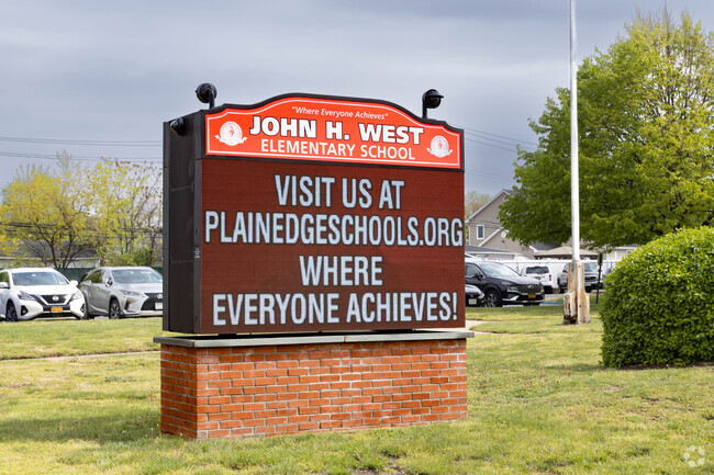 There are approximately 450 students in grades K-5 at the John H West Elementary School in Plainedge, NY.