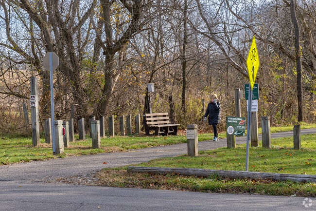 Walkers from Mayflower Village enjoy the morning walk along Sippo Valley Trail.