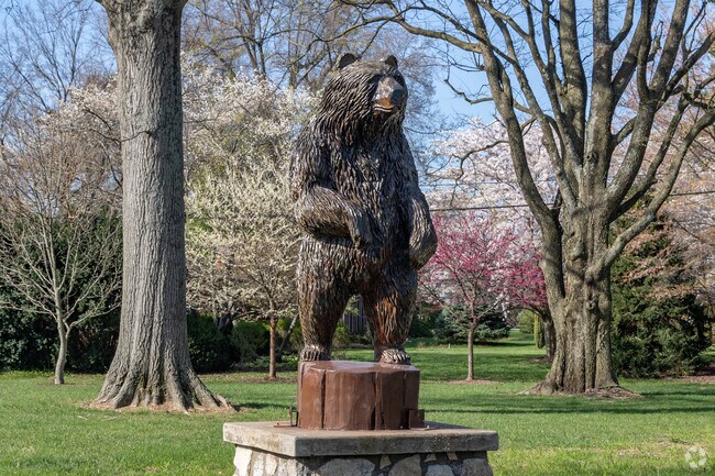 Rudy the Bear watches over the Windy Hills Green park.