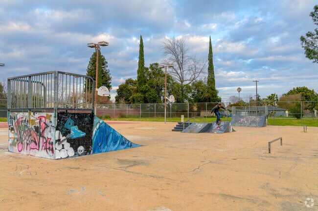 A man practices his tricks at the Friendship Park skateboard area.