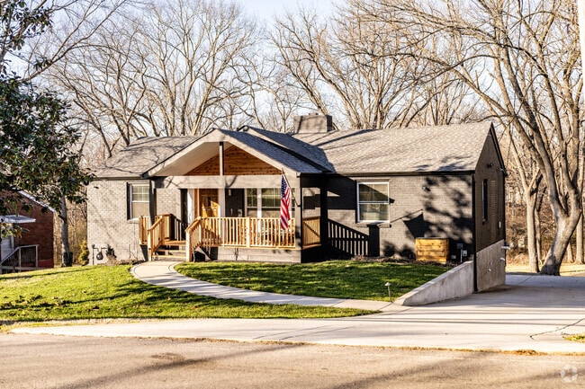 Driveways and mature trees surround ranch-style homes in Talbot's Corner.