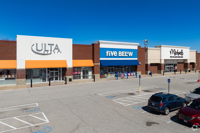 Explore diverse stores and services along bustling N Hwy 67 near Ferguson, MO.