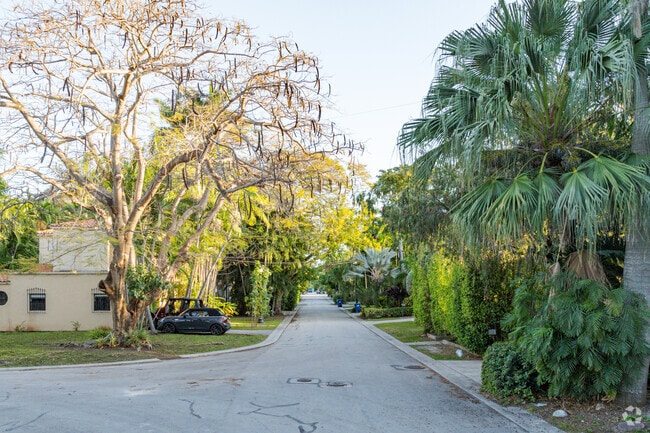 Many of the residential streets on the Venetian Islands are covered with trees and landscaping.