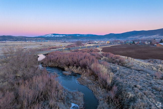 Main Street crosses the Susan River as commuters travel on Highway 36.