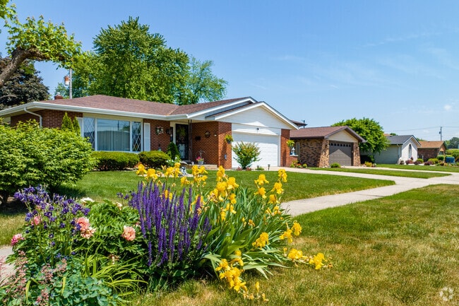 One can enjoy the peace and quiet of suburban living in Highland.